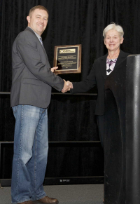 Janet Peterson, CBSP, presenting the Richard C. Knudsen Publication Award to David Pawlowski , 2017 ABSA International Conference